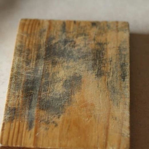 Old warped wood cutting board